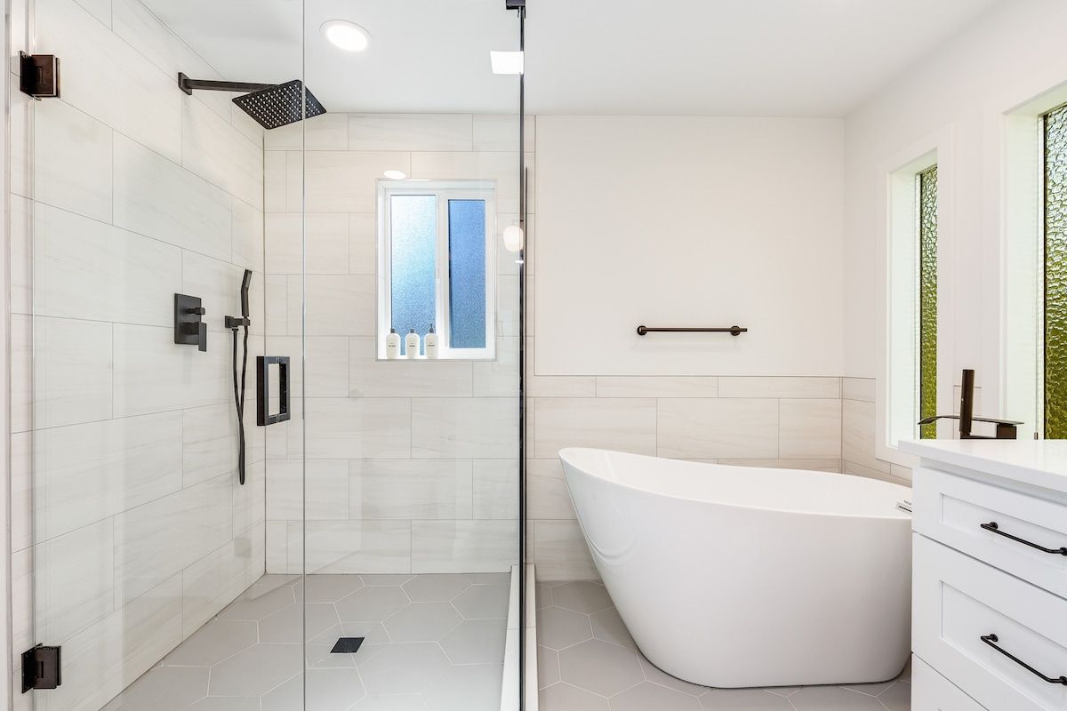 Primary bathroom with walk-in shower and soaking tub