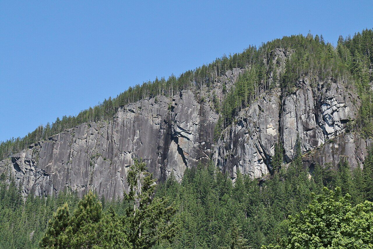 The granite Index Town Walls rising above the trees